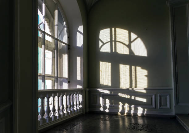 The shadow of the window on the wall.