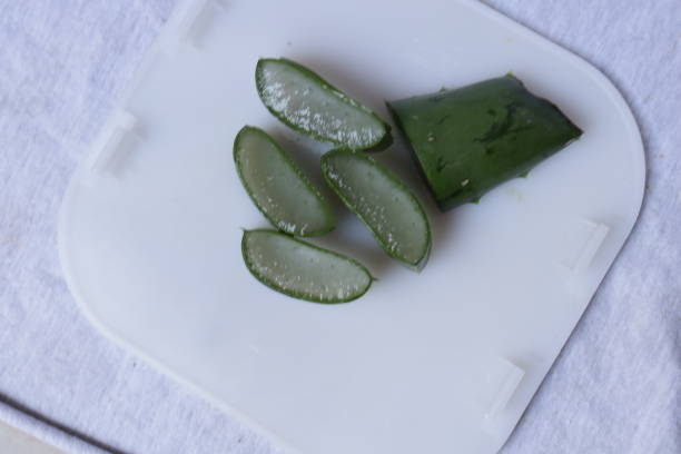 istock Aloe vera pieces of leaf and pulp isolated on a white background 1218384564