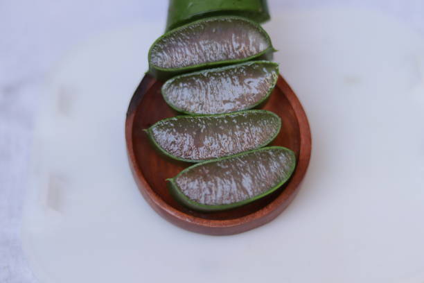 istock Aloe vera pieces of leaf and pulp isolated on a white background 1218384658