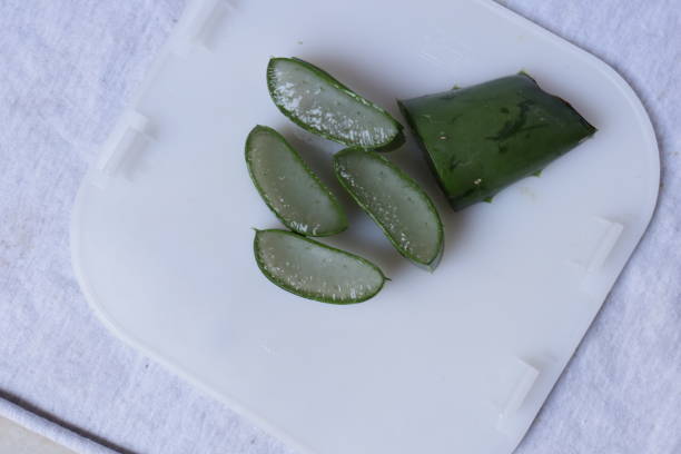 istock Aloe vera pieces of leaf and pulp isolated on a white background 1218384714