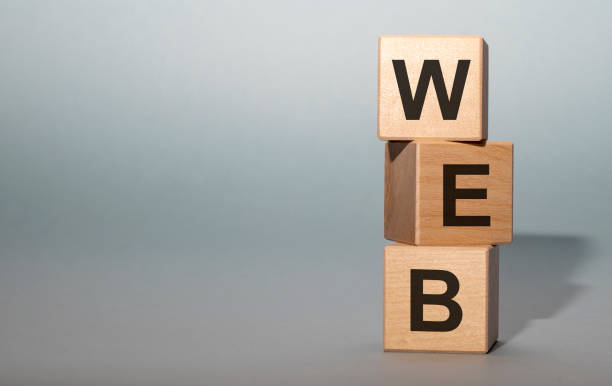 istock Wooden cubes on white blue background word web 1218384732