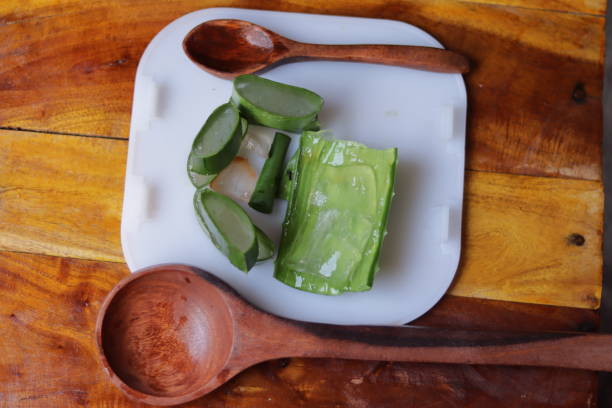 istock Aloe vera pieces of leaf and pulp isolated on a white background 1218384911