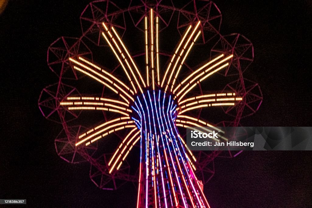 fun ride lights at night Coney Island - Brooklyn Stock Photo