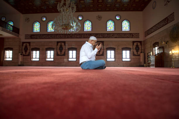 istock Muslim Man Praying in Mosque 1218387380