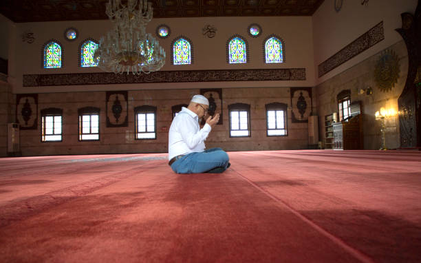 istock Muslim Man Praying in Mosque 1218387736