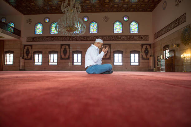 istock Muslim Man Praying in Mosque 1218388548