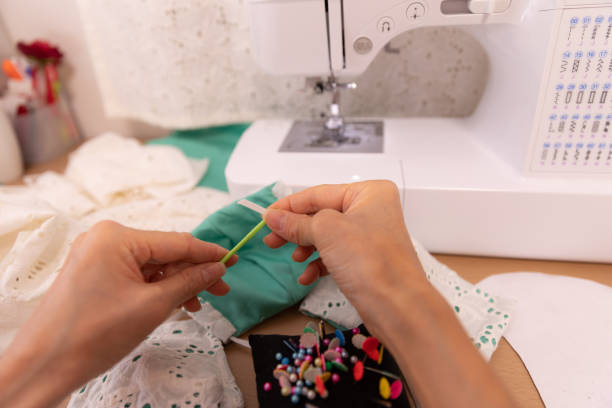 istock Japanese woman making mask at home 1218389650