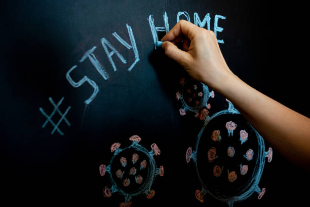 istock Drawing on blackboard with chalk, Coronavirus, covid-19 1218391218