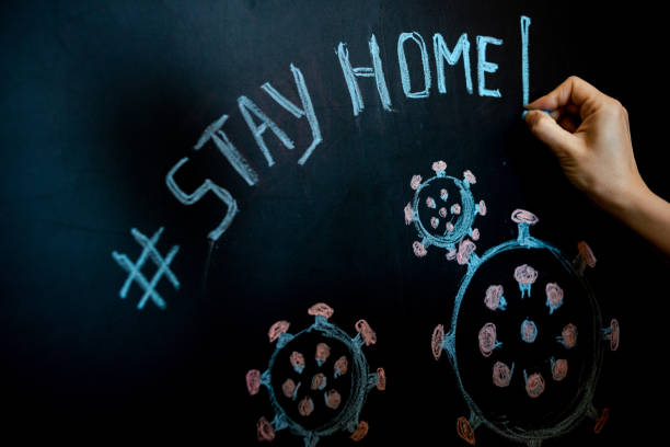 istock Drawing on blackboard with chalk, Coronavirus, covid-19 1218391229