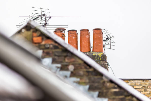 istock London suburb rooftops in snowy winter day, UK 1218392709