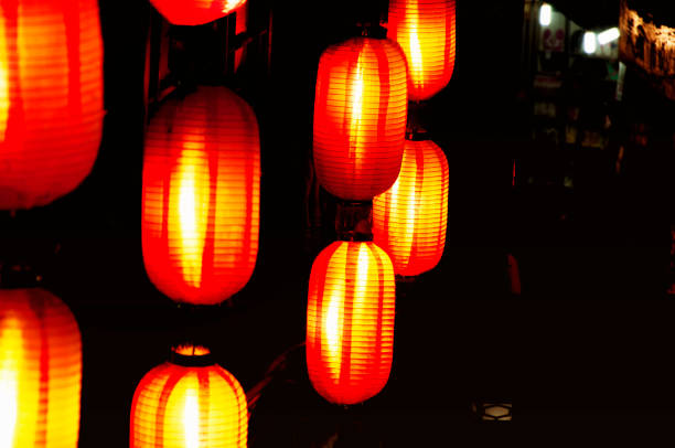 istock Red Chinese lanterns illuminated Fenghuang China 1218394465