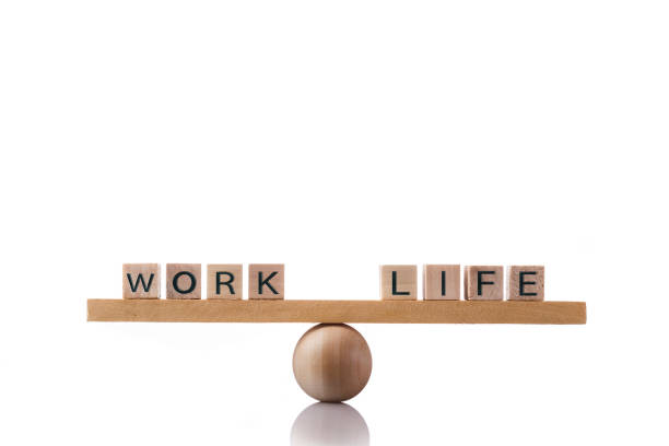 istock The wood cube work and life on plate balance 3d rendering for abstract content 1218395295