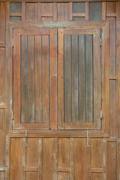 istock wood window and wall, construction of home. 1218396801