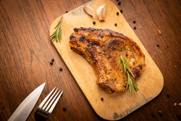 istock Grilled pork chop with spices 1218398044