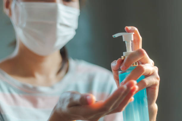 istock Asian woman wearing protective hygiene mask 1218398765