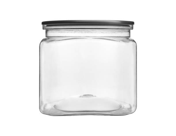 istock Empty transparent glass jar isolated on white 1218398769