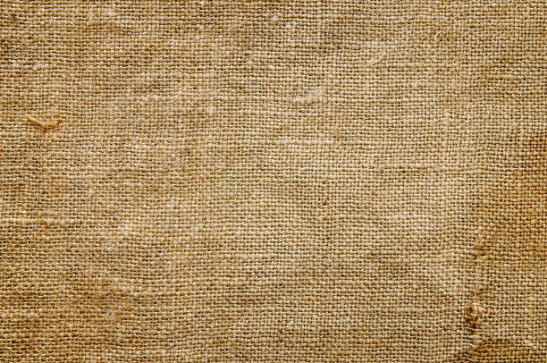 istock A fragment of an old burlap. Textural background. 1218399661
