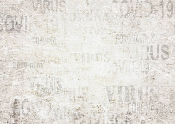 istock Coronavirus Covid-19 news scratched grunge newspaper old paper background 1218400343