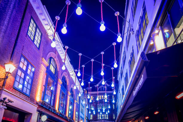 カーナビー、ロンドン、イギリスのクリスマスライト - bus taxi london england double decker bus ストックフォトと画像