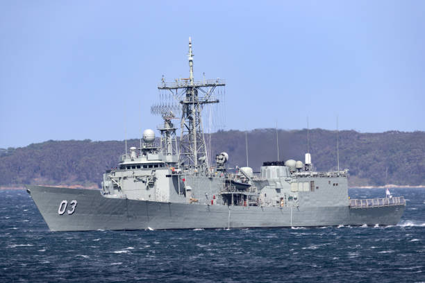 HMAS Sydney (FFG 03) Adelaide-class guided-missile frigate of the Royal Australian Navy. Jervis Bay, Australia - October 1, 2013: HMAS Sydney (FFG 03) Adelaide-class guided-missile frigate of the Royal Australian Navy. australian navy stock pictures, royalty-free photos & images