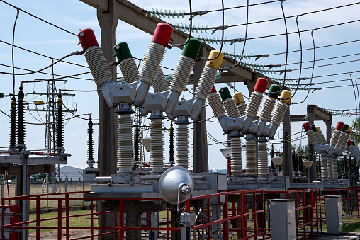 Electricity distribution. Power line and Insulator close-up