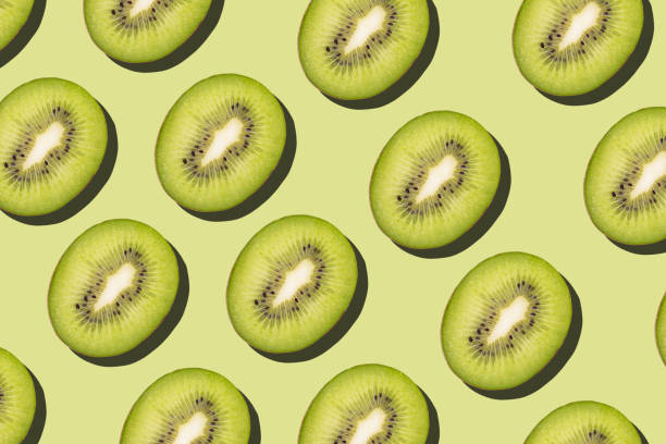 istock Tropical seamless pattern on green background. Flat lay, trendy juicy color. 1218411384