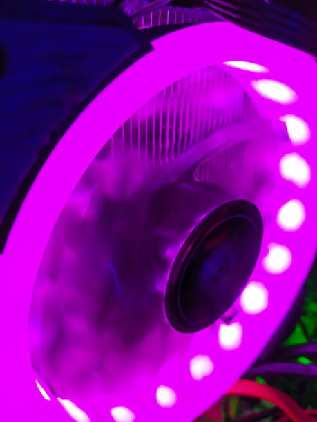 istock Modern computer air cooling with multi-colored led backlight-fans, cooling radiators, cables, boards, close-up, macro. 1218417900