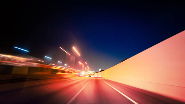 istock Blurred motion of highway speeding 1218417966