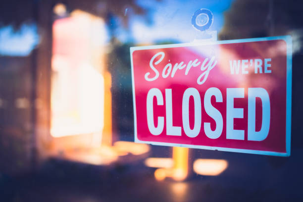 Sorry we are closed Red sign on window informing that the business is closed shut up stock pictures, royalty-free photos & images