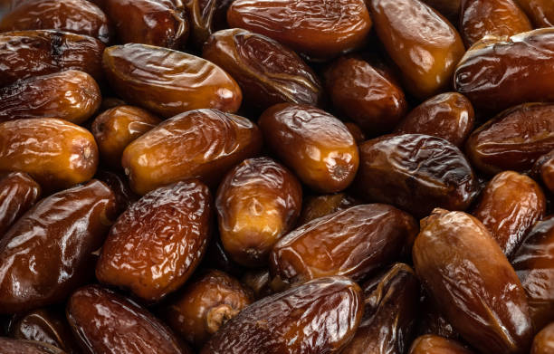 istock The surface texture of selected dried dates. 1218421163