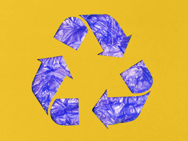 istock The recycling symbol in paper cut technique. 1218421487