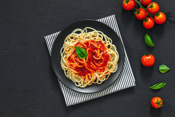 istock lassic italian spaghetti pasta with tomato sauce 1218422643