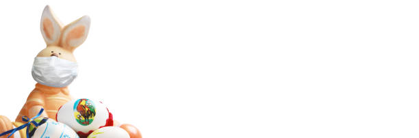 istock Easter rabbit with medical mask at epidemic time 1218424956