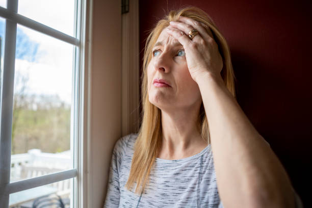 istock Stressed Middle Age Woman Inside Her Home 1218426519