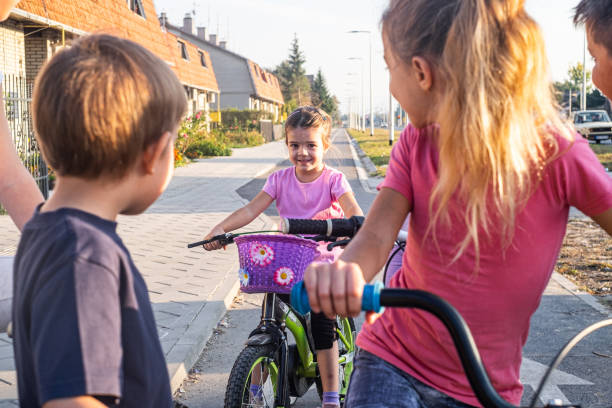 istock Girl on bike 1218427815