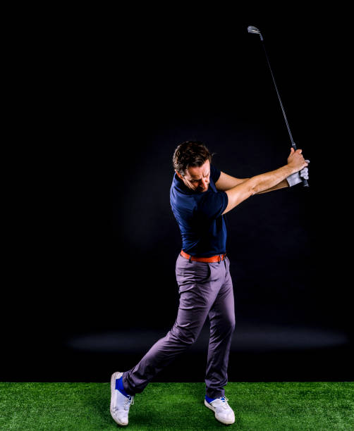 istock Close-up of a golf player intent on perfecting the swing 1218427821