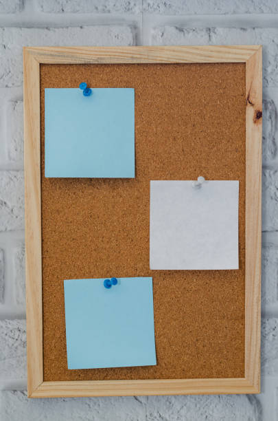 istock cork board reminder with stickers and push pins 1218427941