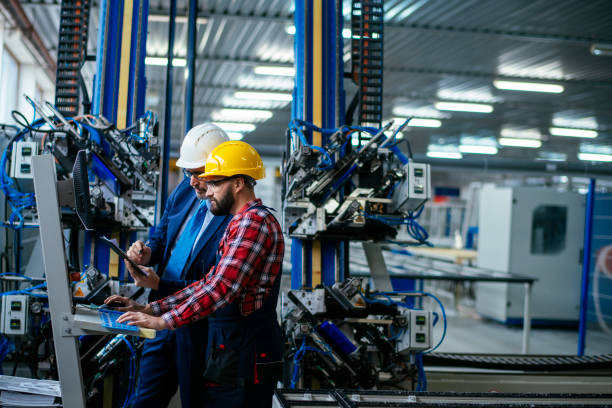 istock Quality inspector and manual worker in a factory 1218429341