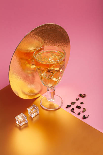 istock Green tea with ice on a pink background. Concept 1218431095