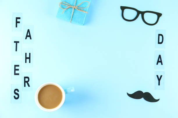 istock Symbolic objects for father's day holiday on textured background. 1218432596
