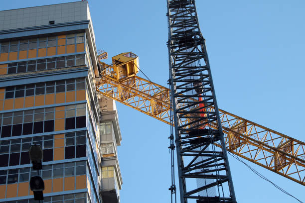 istock the crane fell to a high-rise building 1218432783