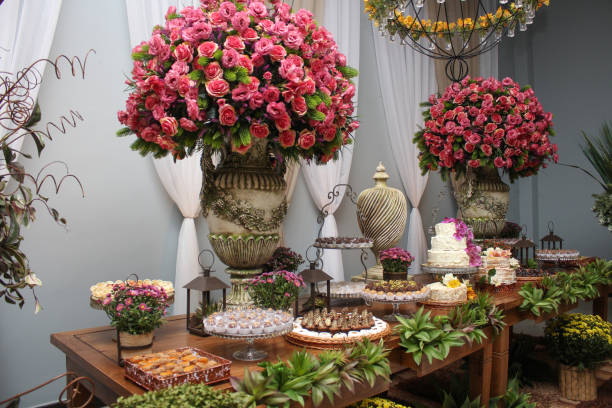 istock Wedding Setup. Cake table with sweet, decoration and flowers 1218432839