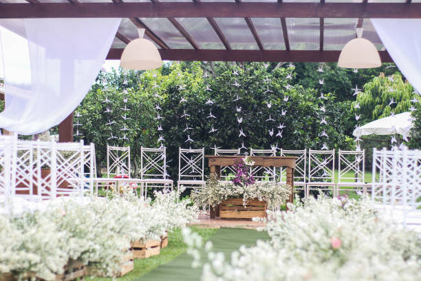 istock Wedding Setup. Wedding ceremony venue. Flowers, chairs and altar 1218432884