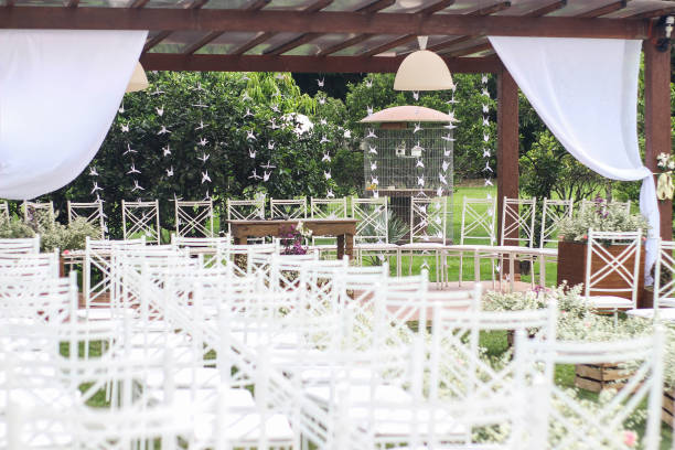 istock Wedding Setup. Wedding ceremony venue. Flowers, chairs and altar 1218432901