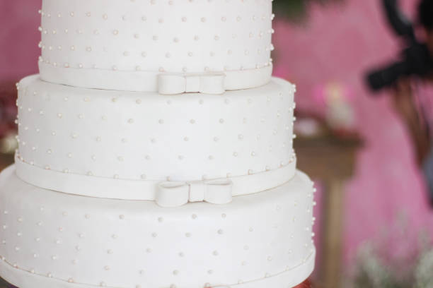 istock Wedding Setup. Cake table with decoration and flowers 1218432917