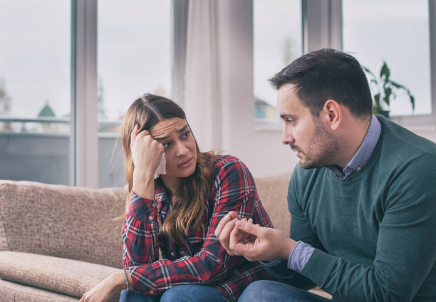 istock Young couple having argue at home 1218433040
