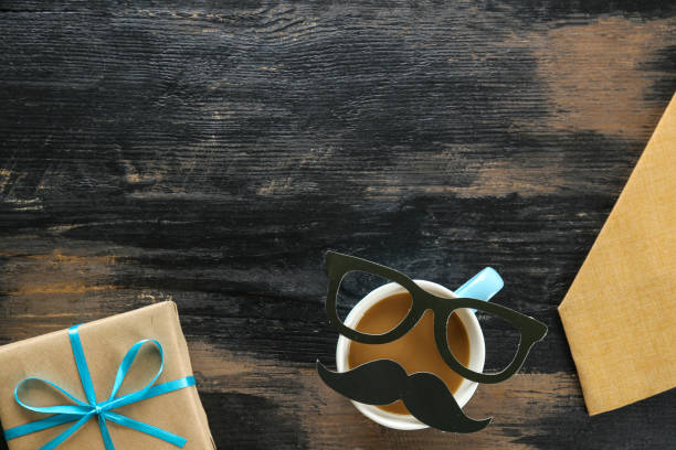istock Symbolic objects for father's day holiday on textured background. 1218433768
