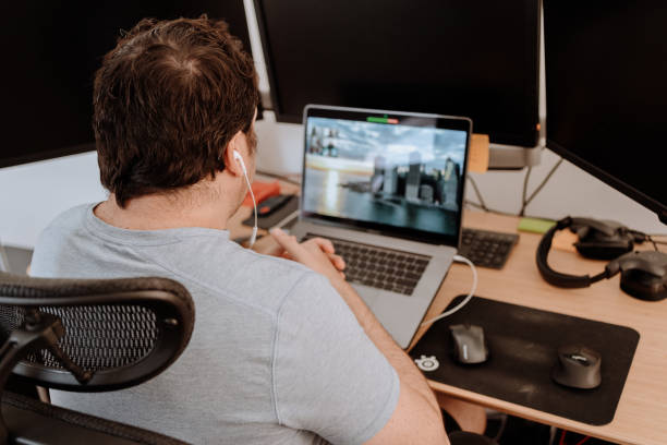 istock Man in teleconference with friends 1218434048