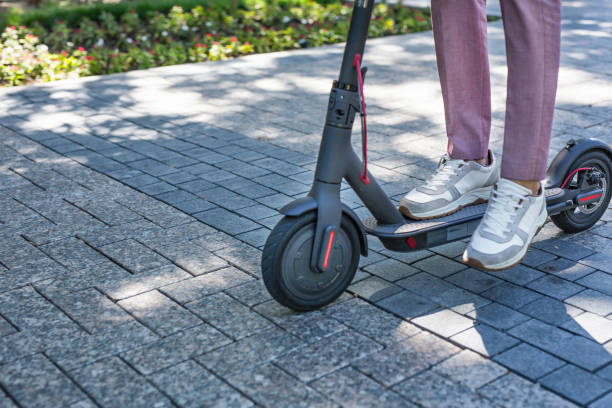 istock Eco friendly transport electro scooter city transport ride 1218438547