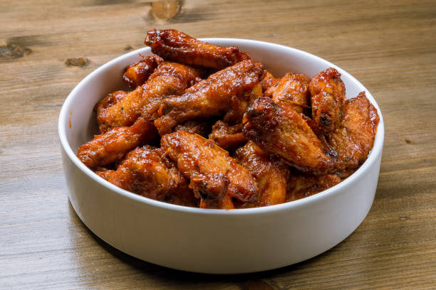 istock chicken wings in barbecue sauce 1218438805